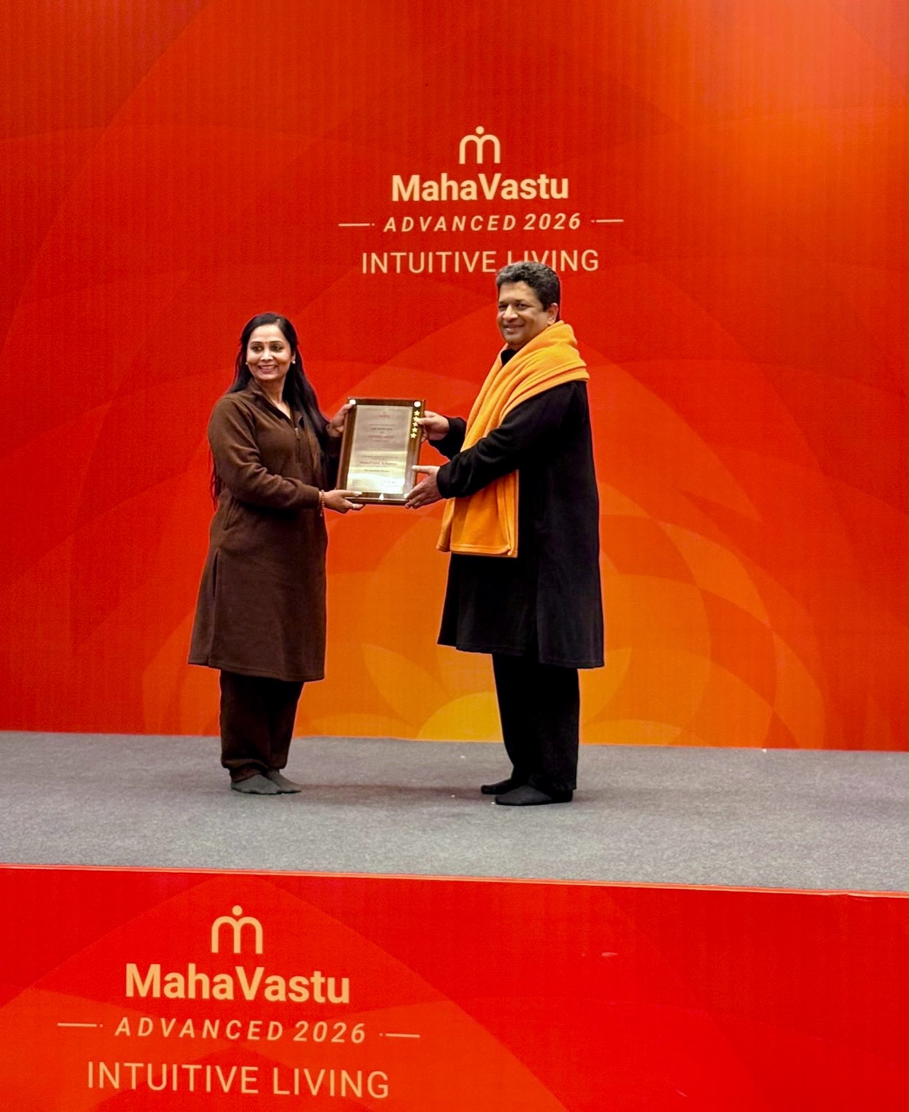 Karishma Kumar receiving certification at MahaVastu Advanced 2026
