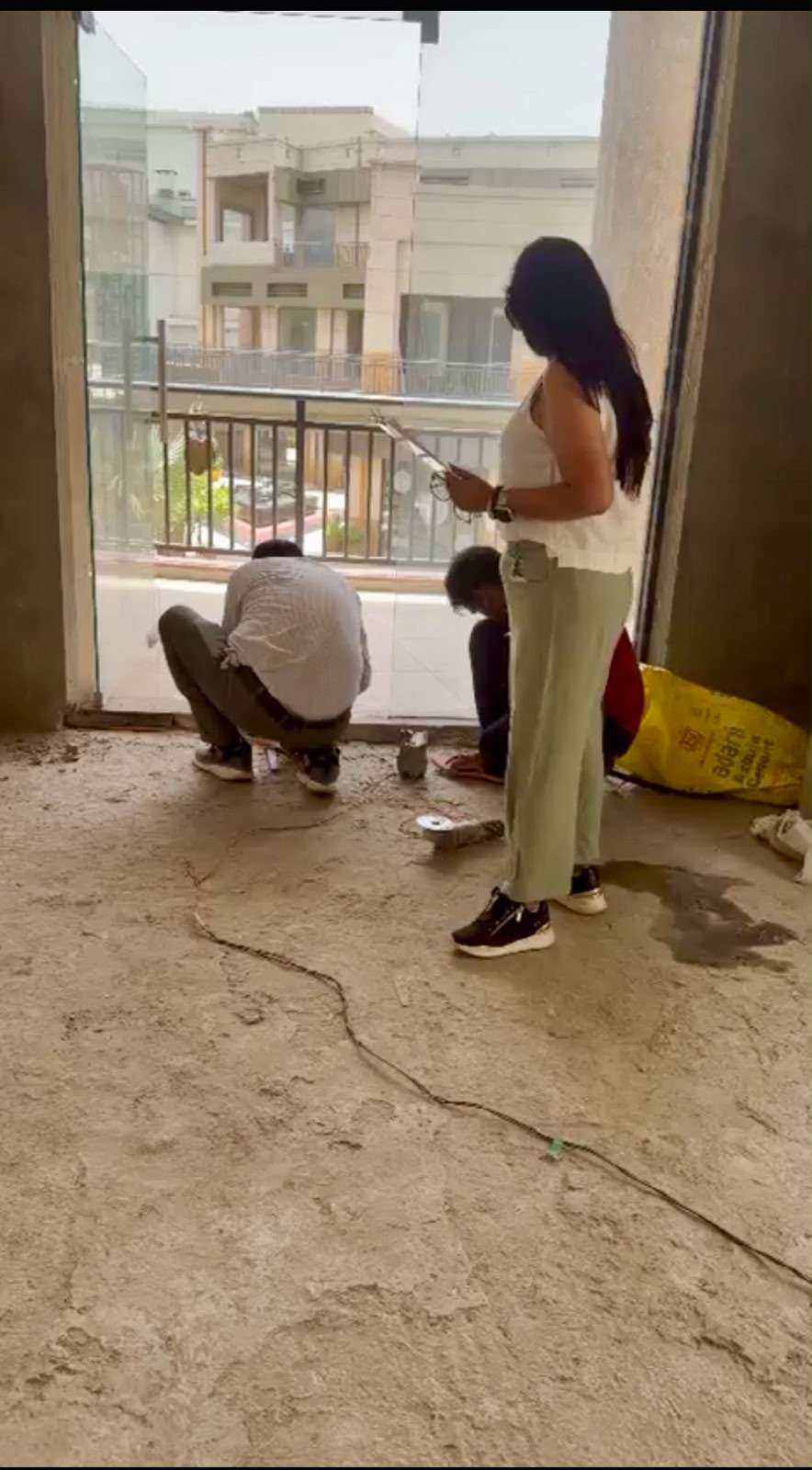 Karishma supervising Vastu implementation on-site